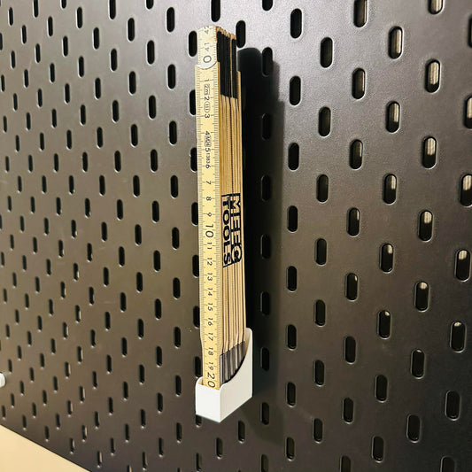 Holder for Tommestokk til SKÅDIS